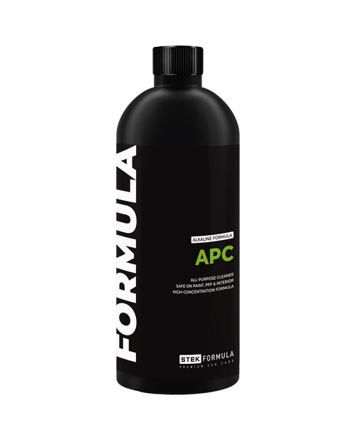 Black bottle of Formula APC cleaner on a white background