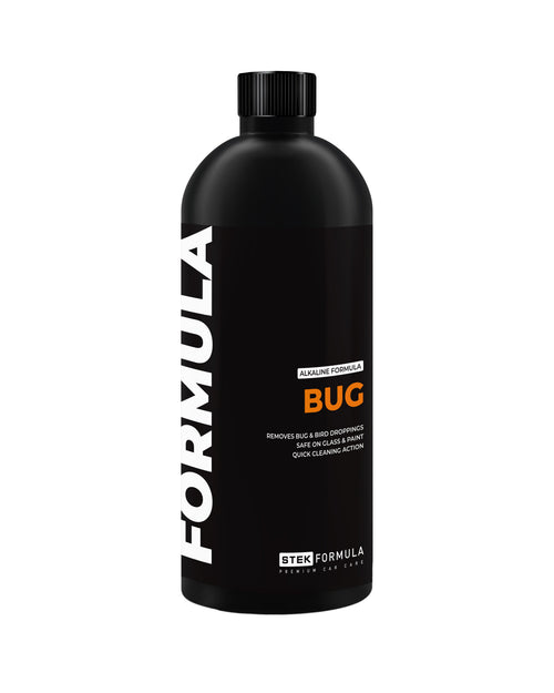 Black bottle of Formula Bug removal product on a white background