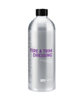 Bottle of tire and trim dressing on a white background